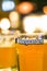 Bangkok, Thailand - Feb 19, 2015: Hoegaarden beer glass at Friday night party at a restaurant bar in Bangkok blur bokeh background