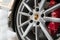 Bangkok, Thailand, January 5, 2020: original Porsche wheel with low-profile tire close-up