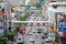 Bangkok, Thailand - July 21 2019: Many car cause traffic jams at Ratchaprarop Road have overpass. Many people walking on Sky Walk
