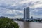 Bangkok, Thailand - July 8, 2017: High rise hotel building at the right-hand side of the `Chao Pra Ya` river in the evening.