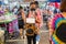 Bangkok, Thailand-June, 06, 2021:  Unidentified blind woman singing for donate money at the market at Bangkok, Thailand