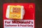 BANGKOK,THAILAND - MARCH 10,2018 : Mc NUGGETS on brown desk with phrase For McDonald`s Customer & Food Only