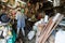 Bangkok, Thailand - March 2019: Carpenter working in his teak wook workshop in Golden Mount region