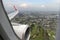Bangkok Thailand - March 30, 2019:The image depicts the view outside the window showing the wing and engine of an AirAsia low-cost