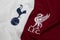 BANGKOK, THAILAND - MAY 11: The Logo of Tottenham Hotspur and  Liverpool on Football Jerseys on May 11,2019. They will Face Each