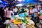 Bangkok, Thailand - May 12, 2020 : People choosing a vegetable at night street market at Bang Rak market