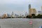 Bangkok, Thailand - May 18, 2019: The landscape skyline at Chao Pra Ya river with boat, pier, tower and skyscrapers  Bangkok Thail