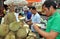 Bangkok, Thailand: Men Selling Durian Fruit