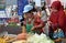 Bangkok, Thailand: Muslim Woman Buying Street Food