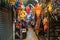 Bangkok, Thailand - November 30, 2019: Stalls selling trinkets and clothing inside an aisle at the Chatuchak Weekend Market