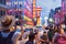 Bangkok, Thailand: passersby, street traffic and colorful neon lights in Yaowarat Road, the main artery of Chinatown, at night