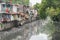 Bangkok, Thailand: slums along a smelly canal Khlong Toei full of mud and garbage in Khlong Toei District