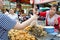 Bangkok, Thailand: Woman selling food