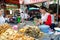 Bangkok, Thailand: Woman selling food