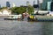 Bangkok, Thatland - FEB 22,2022: A tugboats manoeuvring an sand tanker in Chao Phraya River , Thailand