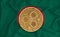 Bangladesh flag, ripple gold coin on flag background. The concept of blockchain, bitcoin, currency decentralization in the country