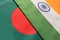 Bangladesh and Indian flags placed on table