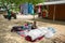 Bangladesh - May 19, 2019: A Rural village Businessman selling cloth and products to hang up on the tree trunk, Meherpur,