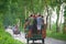 Bangladeshi people travelling on a three wheelers