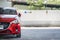 BANGSAN, THAILAND - August 18, Car on blurry foreground with background. in showroom of mazda thailand. Wait maintenance for custo