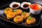 Banh Khot, Vietnnamese mini pancakes with toppings and sweet and sour sauce