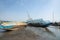 BANJUL, THE GAMBIA - NOVEMBER 19, 2019: Old and abandoned ships anchored in Banjul Bay, at low tide