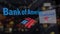 Bank of America logo on the glass against blurred business center. Editorial 3D rendering