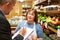 Bank Manager Meeting With Female Owner Of Farm Shop