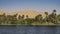 The bank of the Nile River. Along the coastal line there are thickets of green vegetation