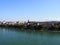 Bank on Rhine River in swiss city center of Basel in Switzerland with representative historical buildings