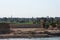 Bank of the Suez Canal, panorama view from transiting cargo ship.