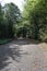 banked curve at the end of the steep part of the SÃ¼dschleife of NÃ¼rburgring, lost in the forest