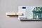 Banking and economic or financial crisis. Inflation and depreciation money concept. Euro banknotes and a clothespin