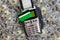 Banking terminal with green credit card and dollar background