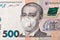 Banknote of 500 hryvnia depicting Gregory Skovoroda in a medical mask during the economic crisis and pandemic of the coronavirus.