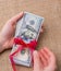 Banknote bundle of US dollar tied with a ribbon