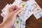 Banknotes of 1000 hryvnia in a woman`s hand. Close-up.