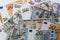 Banknotes of different countries background, top view