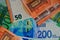 Banknotes paper Israeli shekel, 50, 100 euros. Close-up, Top-view, background of colored money