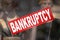 Bankruptcy banner in a window shop