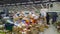 Bankruptcy of supermarket Spar, the largest retailer. Clutter, trash and scattered goods on dirty floor in the store. Mess, huge p