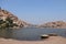 Banks of Tungabhadra river in Hampi, Karnataka - coracle boats ready for tourist rides