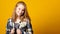 Banner. Beautiful young girl, smiling sweetly, holding dollars, wearing a plaid shirt, received a scholarship