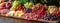 A banner with a continental breakfast with grapes, strawberry, cheeses, cold cuts and bread