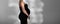 banner. without a face. a pregnant woman in a black tight dress.