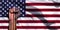 Banner of Flag of Unites States of America painted on male fist, fist flag, country of USA, strength, power, concept of conflict.