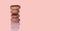 Banner of  four doughnuts on pink background