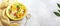 Banner with Fresh summer salad with edible flowers nasturtium, borage flowers in a bowl. Web banner, copy space. Vegan food
