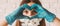 Banner happy beautiful girl doctor showing heart love sign with hands