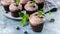 Banner Homemade cupcakes with blueberries on dark blue concrete background